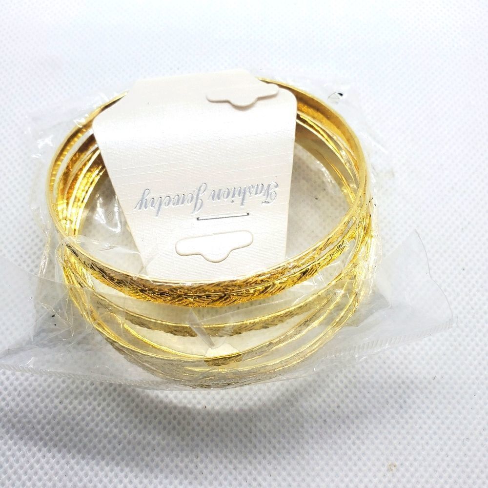 NWT Fashion Jewelry Set of 8 Gold Tone Bangle Bracelets